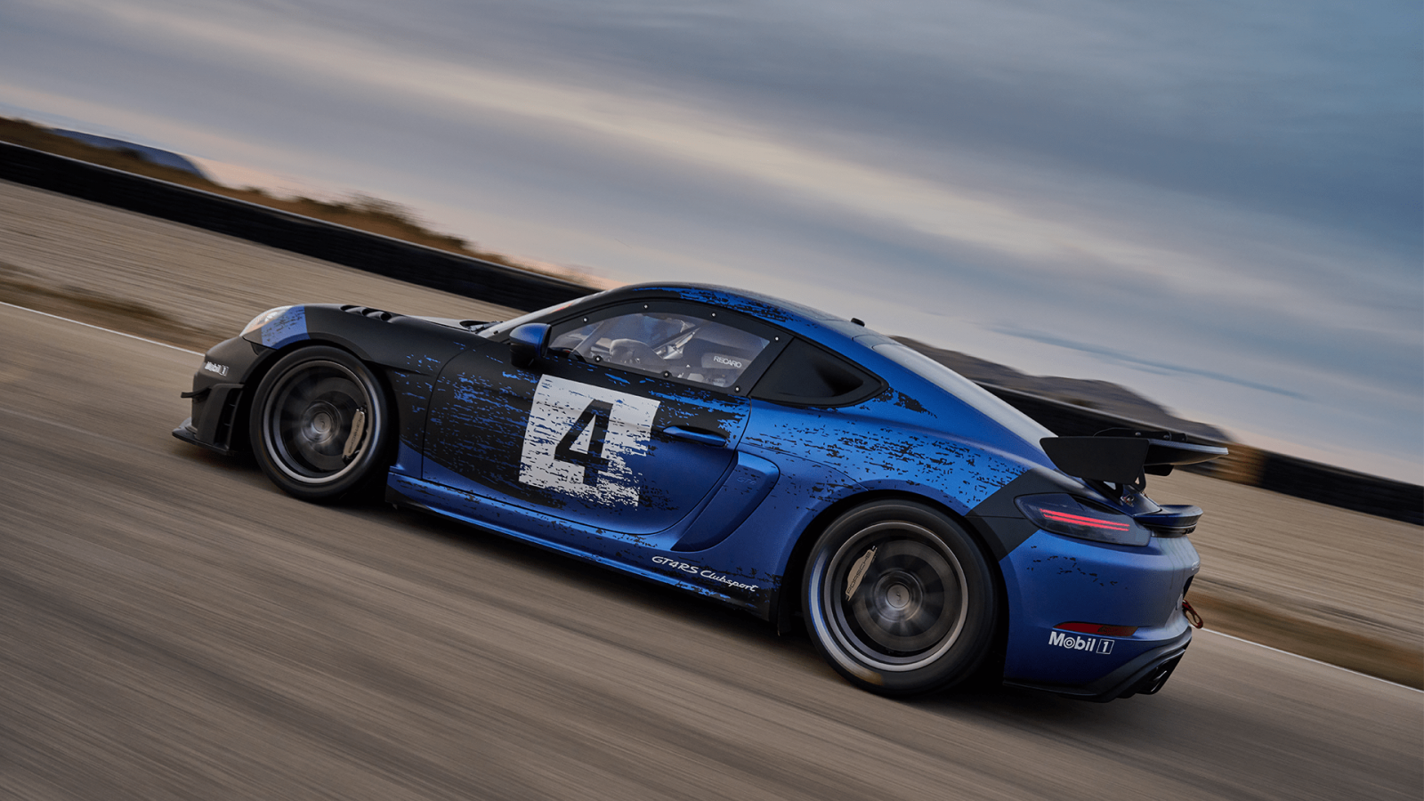 Avi Malavalli racing a touring car at speed